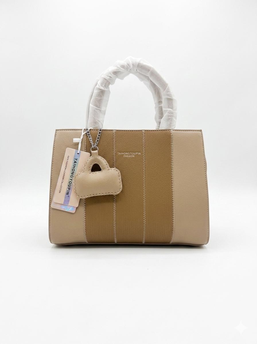 TAIHONGYOUPIN Stitch-Panel Tote with Mini Bag Charm — Camel/Beige